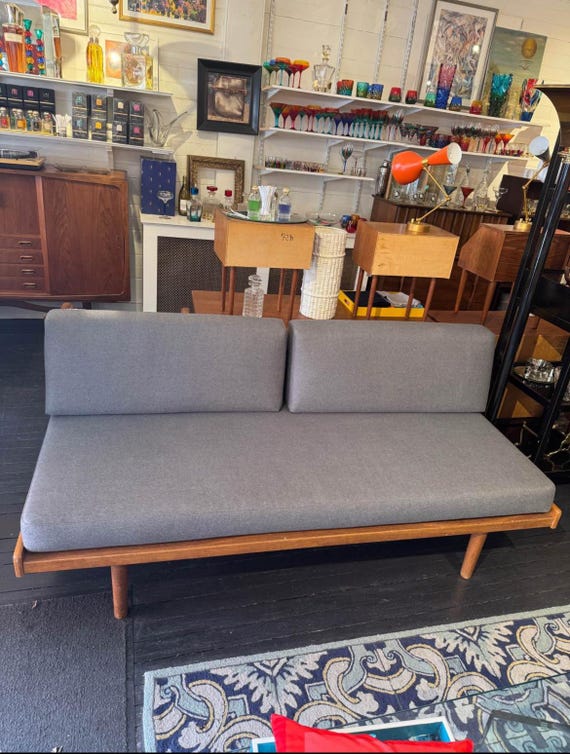 Mid-century curated, teak danish loveseat