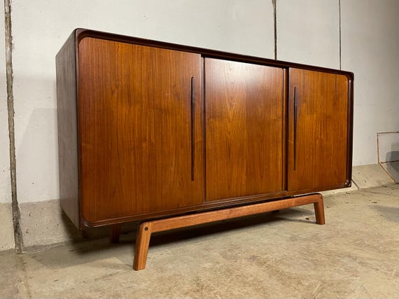 Mid century Teak sideboard with sliding doors