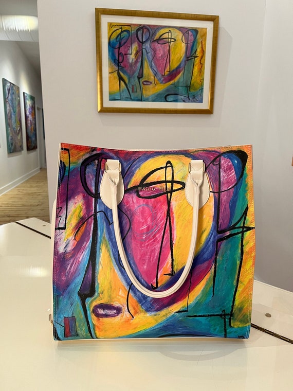 Backorder MAGIC HILL's exclusive Bruce Mishell Collection tote bag brass hardware and silk lining.