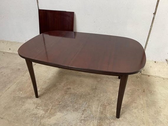 Mid-Century Rosewood dinning table with two leaves 1960's