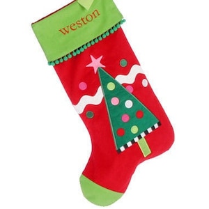 May include: Red and green Christmas stocking with a green tree applique and the name "Weston" embroidered on the cuff.