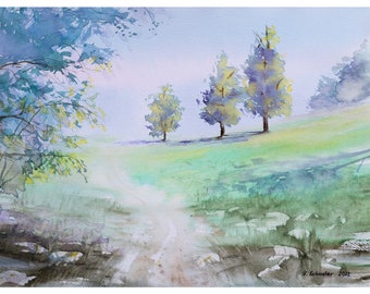 May include: Watercolor painting of a serene landscape with a path leading through a grassy field. Trees with yellow and purple foliage stand on a gentle slope. The sky is a soft blue, and the overall scene evokes a sense of peace. Signed "Y. Schuster 2002".