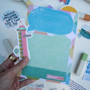 May include: A colorful notepad with a speech bubble and a green rectangle for writing. The notepad has the text "Thank you Jesus" and "answered?" on it. There are also stickers with text like "Perhaps you were born for such a time as this" and "Jesus Saves".