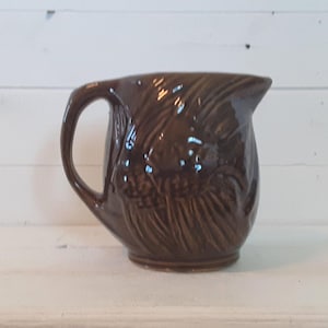 Vintage 6.25" Tall McCoy Dark Brown Glazed Stoneware Pottery Water Milk Pitcher Vase Embossed Angel Fish Nautical Cabin Lake Beach Decor