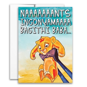 May include: Greeting card featuring a cartoon lion cub held up in the air. The card has the text "NAAAAAANTS INGONYAMAAA BAGITHI BABA..." in large, bold letters against a watercolor background. The card is white with a matching envelope.
