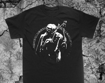 May include: Black t-shirt with a white graphic of a person playing a violin inside a circle with text around it.