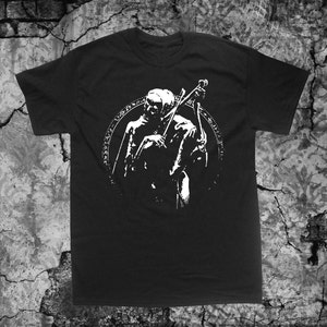 May include: Black t-shirt with a white graphic of a person playing a violin inside a circle with text around it.