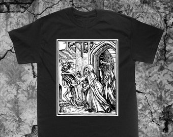 May include: Black t-shirt featuring a black and white woodcut-style illustration. The graphic depicts a skeletal figure leading robed figures through a doorway. The artwork has a gothic or medieval theme.