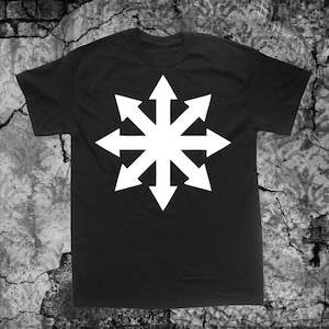 May include: Black t-shirt with a white eight-pointed star design. The star has eight arrows pointing outwards.