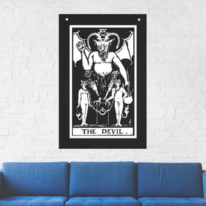 May include: Black and white tarot card illustration of The Devil card. The Devil is depicted as a horned, winged figure sitting on a throne. Two figures, a man and a woman, are chained to the throne. The card is titled "THE DEVIL."