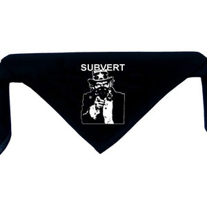 May include: Black bandana with a white graphic of Uncle Sam wearing a mask and pointing with the text "SUBVERT" above him.