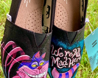 Hand painted glittery Cheshire Cat Toms. Perfect Gift. I can add name or favorite quote.