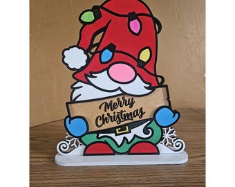 Gnome holding a sign