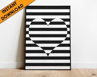 May include: Black and white striped print with a white heart shape in the center.