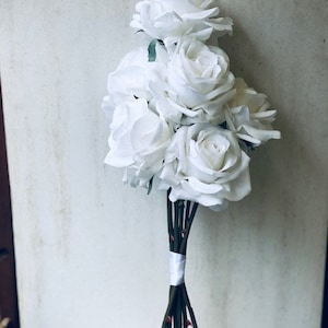 Large open latex winter white rose bouquet