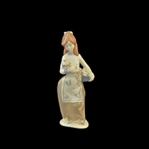 Vintage Nadal Young Girl Holding two puppies Porcelain Figurine