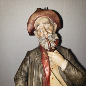 Vintage Capodimonte Italian “Rabbit Hunter” Porcelain Figurine