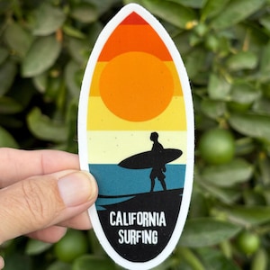 California Surfing Surfboard Sticker with Sunset Surfer Silhouette. Vinyl decal sticker for surfers. Car decal.