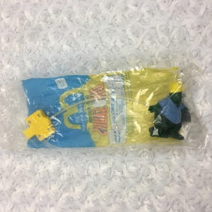 Vintage 1992 Disney Dinosaurs Dino-Motion Earl Sinclair Sealed McDonalds Happy Meal Toy