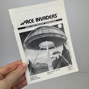Vtg 1986 Atari Space Invaders 7 page Game Program Instruction Manual CX2632 ONLY