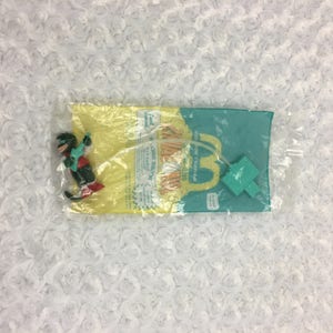 Vintage 1992 Disney Dinosaurs Dino-Motion Robbie Sinclair Sealed McDonalds Happy Meal Toy