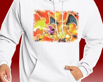May include: White hoodie with a graphic print of a cartoon orange and yellow dragon breathing fire. The dragon is set against a background of orange and yellow flames.