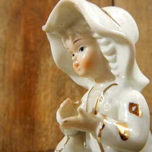 Vintage young boy figurine