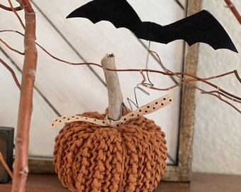 Crocheted stuffed pumpkin with driftwood stem and floating leather bat, vintage Halloween, harvest, primitive Halloween