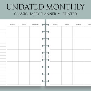 May include: Undated monthly planner with a classic happy planner design. The planner is printed and has a white background with black grid lines. The days of the week are labeled at the top of each column. The planner has a spiral binding.