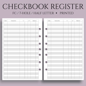 May include: A black and white checkbook register with the text "CHECKBOOK REGISTER" and "FC/7-HOLE/HALF LETTER PRINTED" at the top. The register has columns for date, transaction, +/- , check, and balance.