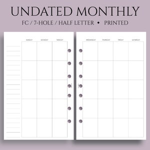 May include: Undated monthly planner with 7 holes, printed on half letter size paper. The planner has a grid layout with days of the week labeled at the top. The planner is white with a light gray border.