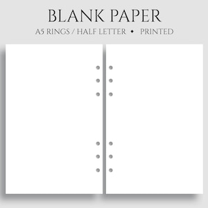 May include: Two blank white pages with punched holes down the center. The pages are labeled "BLANK PAPER" and "A5 RINGS / HALF LETTER - PRINTED".