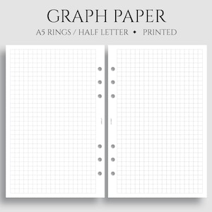 May include: A5 size graph paper notebook with a half letter size page. The notebook has a white cover and is printed with a grid pattern. The notebook has a ring binding and is designed for use with a punch.