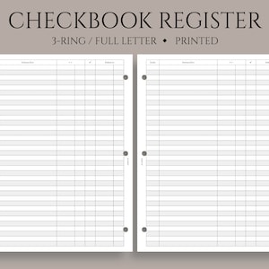 May include: A black and white checkbook register with the text "CHECKBOOK REGISTER" and "3-RING / FULL LETTER • PRINTED" at the top. The register has two pages with columns for date, transaction, +/- , check, and balance.