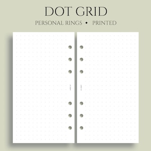 May include: Two white sheets of dot grid paper with holes punched along the side for a personal size planner. The paper is designed for use with a personal size planner.