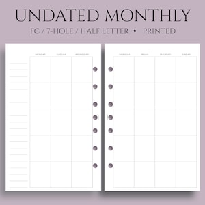 May include: Undated monthly planner with seven holes, printed on half letter size paper. The planner has a grid layout with days of the week labeled at the top.