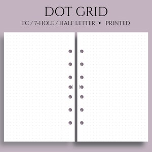 May include: A white, printed, dot grid notebook with 7 holes for a binder. The notebook is half letter size and is designed for use with a disc bound planner.
