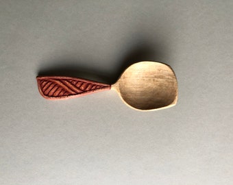 Sycamore spoon with reeded handle.