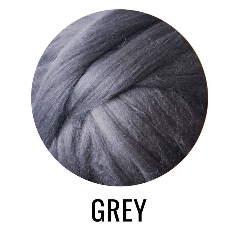 May include: A close-up of a ball of grey wool yarn. The yarn is soft and fluffy, and it is perfect for knitting or crocheting.