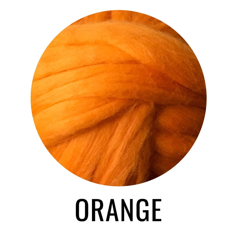 May include: A close-up of a ball of orange wool fiber. The wool is soft and fluffy, and it is perfect for crafting.