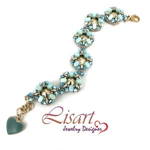 May include: A light blue beaded bracelet with a heart-shaped charm. The bracelet is made with small, round beads and features a silver clasp.
