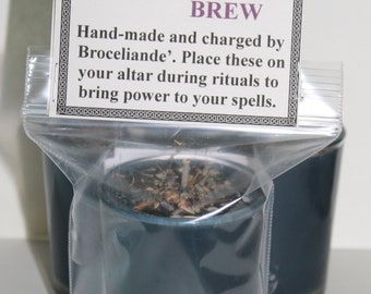 May include: A small blue votive candle with a label that reads "Circle of Power Ritual Votive Witches Brew" and "Hand-made and charged by Broceliande'. Place these on your altar during rituals to bring power to your spells."