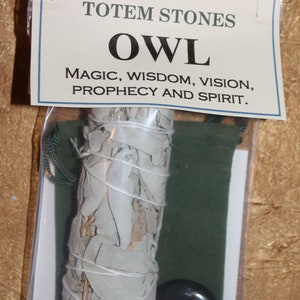May include: White sage smudge stick wrapped in white twine, with a green pouch and a black stone with a gold owl design. The label reads "Gypsy Heaven Totem Stones Owl Magic, Wisdom, Vision, Prophecy and Spirit."