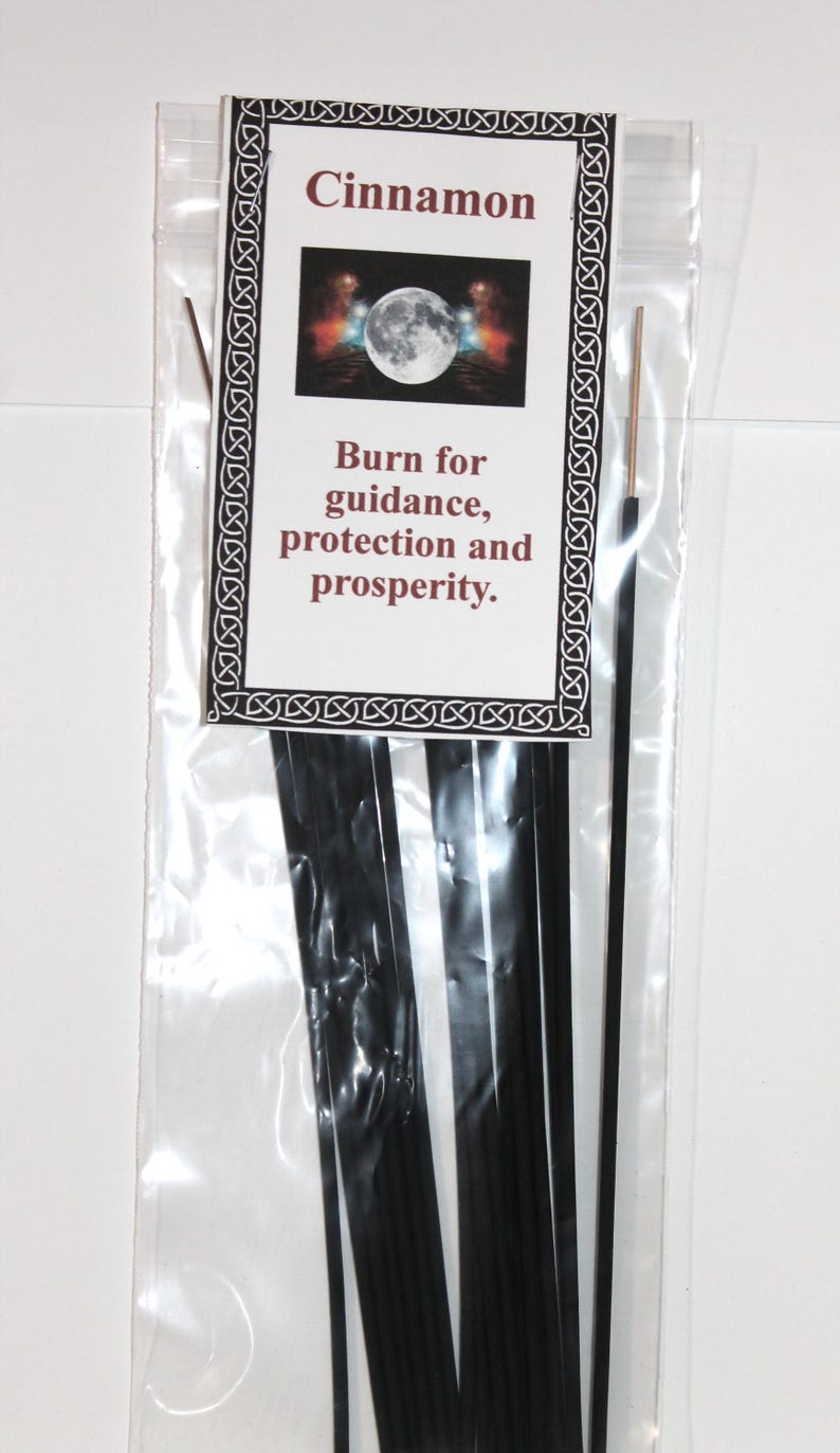 May include: A package of black cinnamon incense sticks with a label that reads "Cinnamon" and "Burn for guidance, protection and prosperity."