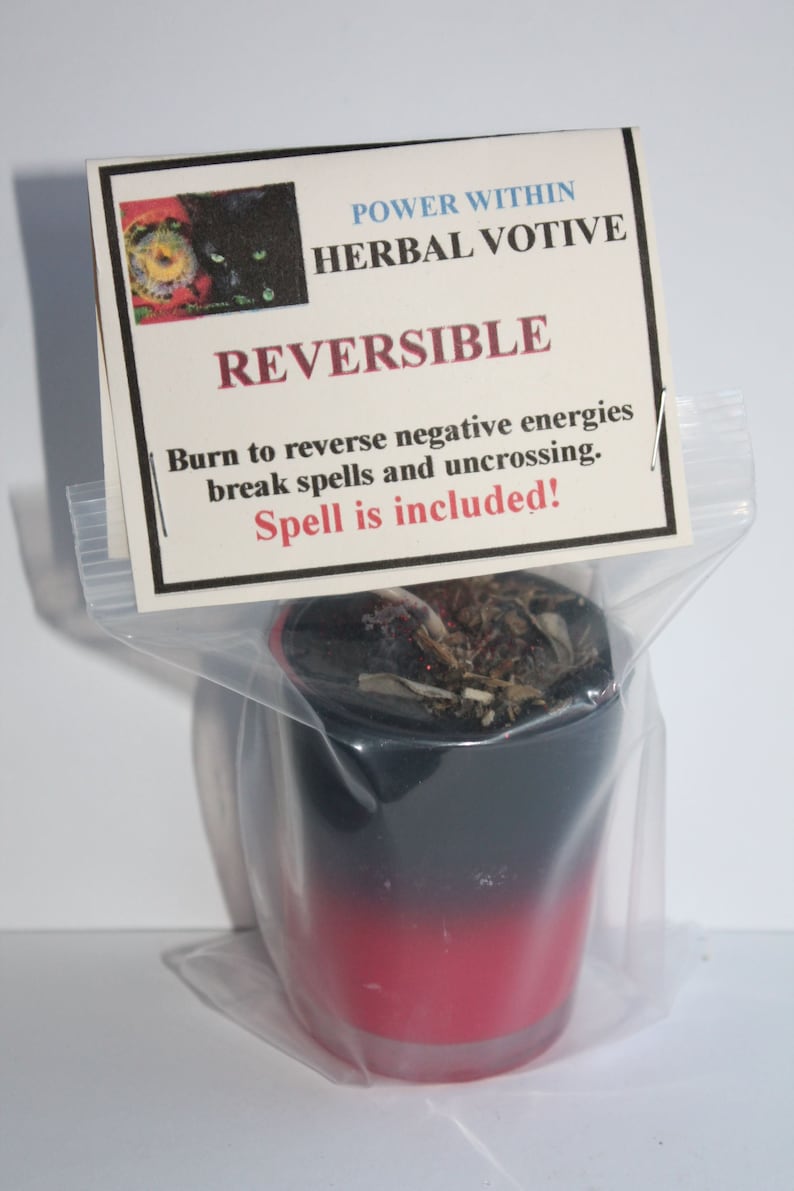 May include: A black and red votive candle in a clear plastic bag. The candle has a black top that fades into red. A label reads "POWER WITHIN HERBAL VOTIVE REVERSIBLE" with instructions to reverse negative energies. The spell is included.