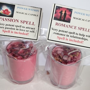 May include: Two pink glass candle jars with a white wick and rose petals inside. The jars are labeled "POWER WITHIN MAGICAL CANDLE" with the text "PASSION SPELL" and "ROMANCE SPELL" on the labels. The text on the labels reads "Very potent spell to attract more passion in love or self. Spell is included!" and "Very potent spell to help with romance in relationships. Spell is included!"