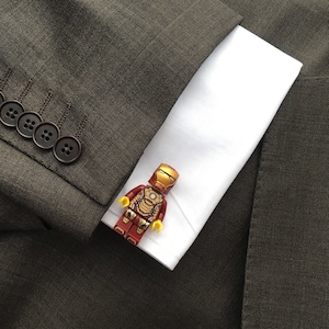 Comic book cufflinks toy figures