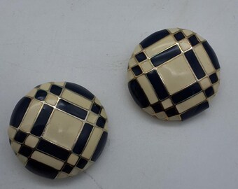 Vintage geometric clip-on earrings by Nina Ricci from the 80s