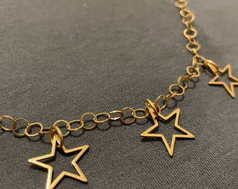 Stainless steel gold link necklace. stars.