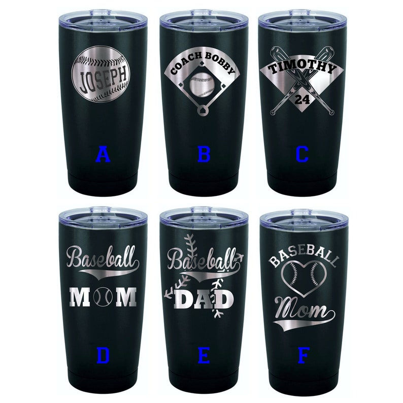 May include: Six black stainless steel tumblers with various baseball-themed designs. The designs include a baseball with the name "Joseph", a baseball diamond with the text "Coach Bobby", crossed baseball bats with the name "Timothy" and the number "24", a baseball with the word "Mom", a baseball with the word "Dad", and a baseball with a heart and the word "Mom".